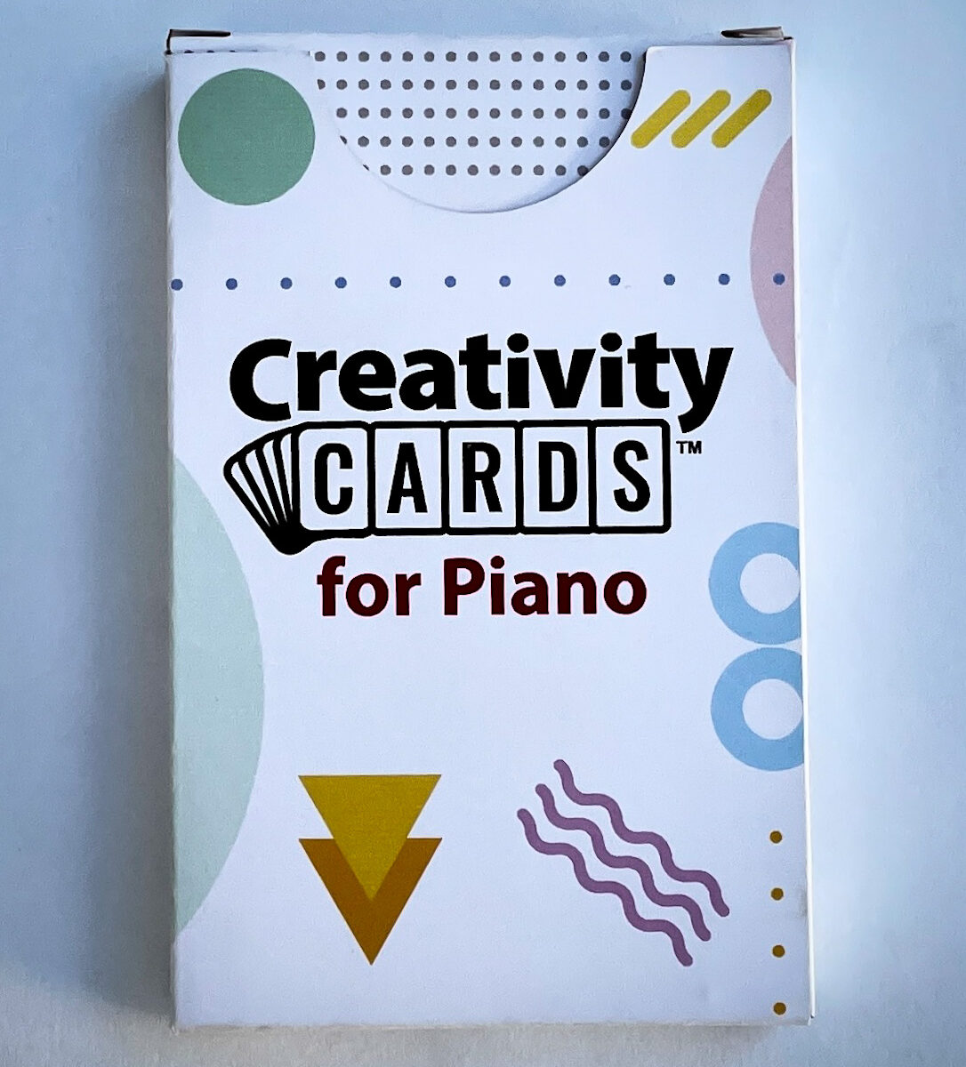 a box of Creativity Cards flashcards for use in a piano lesson