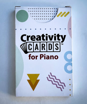 a box of Creativity Cards flashcards for use in a piano lesson
